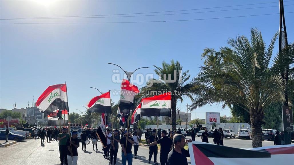 بغداد.. تظاهرة غاضبة في الجادرية دعما للشعب اللبناني والفلسطيني (صور)